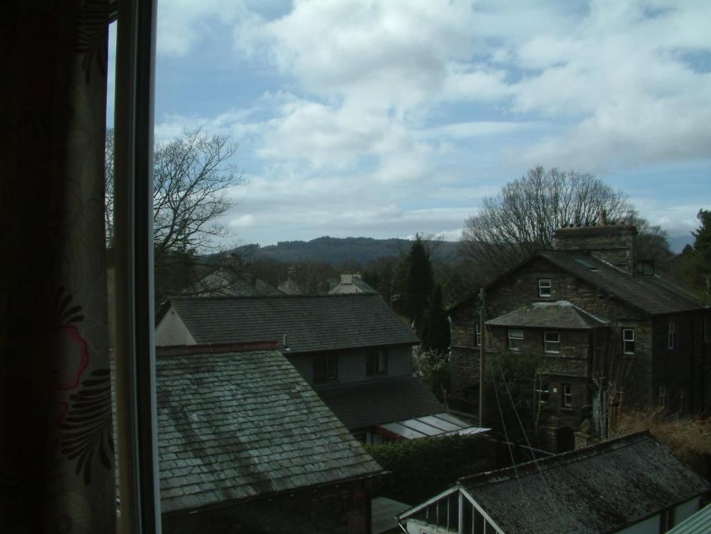 View from a guest room window over Lakeland rooftops to the fells
